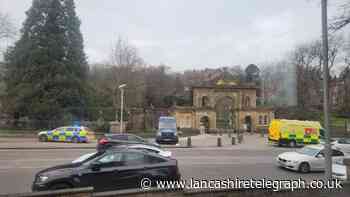 Police and ambulance at scene of incident near to Blackburn park