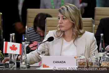 Joly and Chinese counterpart confront each other over interference claims