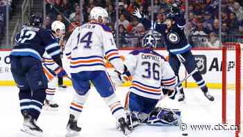 Morrissey's 3-point night leads Jets past Oilers in high-scoring affair