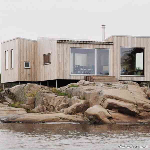 Line Solgaard Arkitekter raises ash-clad cabin over rocks on Norwegian island