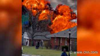 Video shows flames erupt after overturned tanker truck explodes