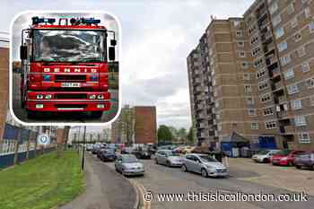 Police investigate fire in Enfield tower block hallway