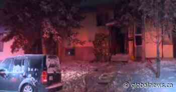 Woman taken to hospital after house fire in northeast Calgary