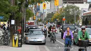 Toronto cycle track construction begins on College Street Monday