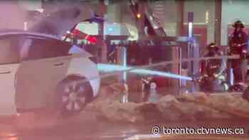 Driver arrested after Tesla crashes and bursts into flames in downtown Toronto