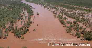 Amazing vision of key outback bridge buried by flood water