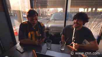 'What the f**k just happened?' Car smashes into café during podcast recording