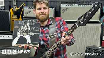 Guitar handed to Chuck Berry at concert sells at auction