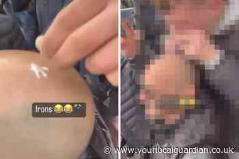 Video shows West Ham fan sniffing white powder off man's head