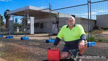 A man with his jerry can is answering a small town's call to fill 'er up