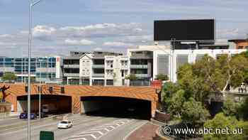 Permanent lights out for two electronic billboards over Perth freeways