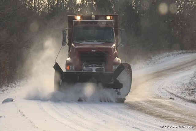 Snow through late morning with colder temps