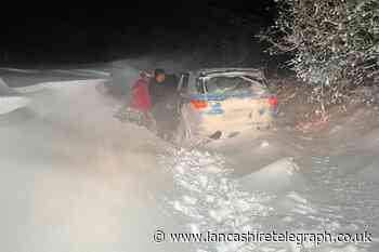 Snow: Mountain rescue team save stranded motorist near Wycoller