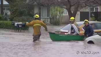 Woodlake neighborhoods flooded by overflowing creek during storm