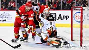 Gibson stops 36 shots, breaks all-time franchise saves record as Ducks defeat Flames