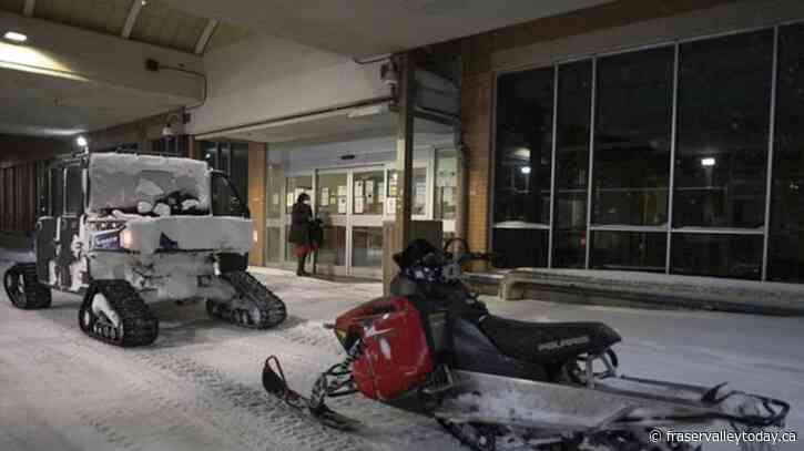 B.C. conservation officers on snowmobiles rescue man stuck in snowstorm