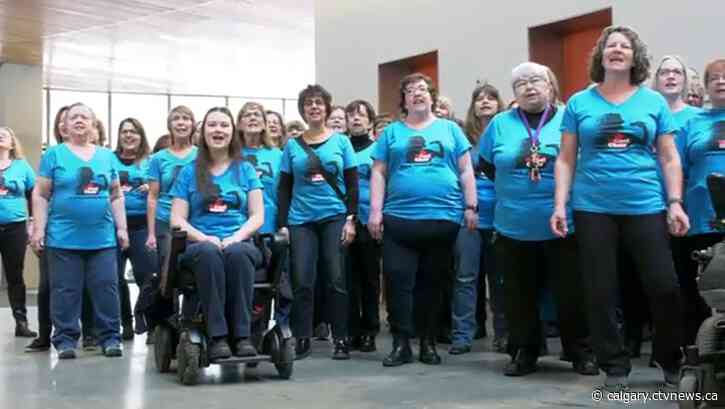 Flash mob takes over Central Library to sing opening song to 1988 Olympics