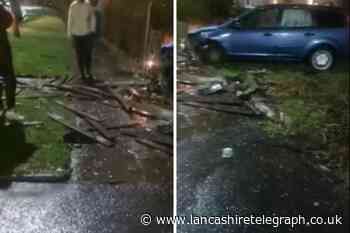 Car crashes into garden on Blackburn estate causing extensive damage