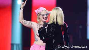 Topless protester crashes Junos broadcast, Weeknd wins 5th award