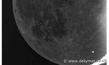 Watch the moment a meteorite slammed into the MOON: Incredible footage shows flash as crater forms