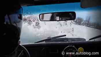 Watch two cars sink in the St. Lawrence River during an ice race