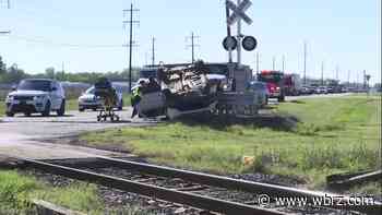 Overturned SUV left in roadway after crash on Scenic Highway