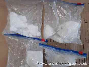 Two men in 20s arrested after weapons and 80 wraps of heroin seized
