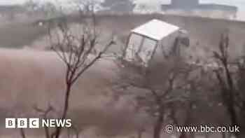 Turkey floods: Truck overturned by surge of water in earthquake zone
