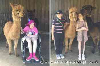 Accrington sight loss charity Henshaws benefits from Tesco grant