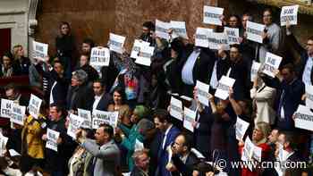 French government forces through higher retirement age, sparking fresh protests