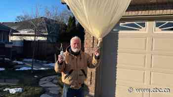 He was sitting at his kitchen table in Amherstburg, Ont., when a weather balloon landed in his yard