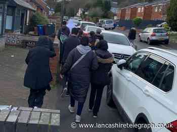 Family walk 5km through Blackburn to raise £1,500 for charity