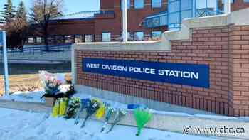 Grief mixes with pride as two Edmonton police officers mourned by their families