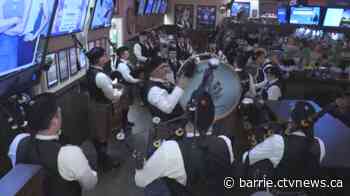 Barrie's Pipes and Drums Band help ring in St. Patrick's Day
