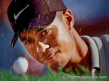Photographic Memory: Throwing sand at a Tiger Woods photo