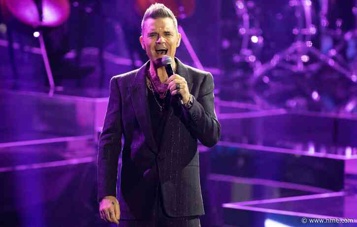 Robbie Williams pulls out same fan at Budapest gig as he did 20 years ago