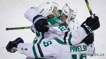 Robertson's OT-winner caps 2-goal night in Stars' victory over Flames