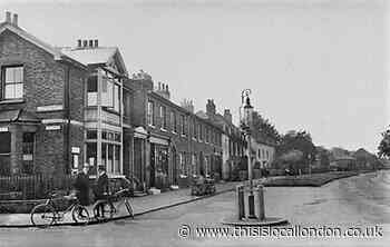Ornate street lamp in Epping High Street a century ago