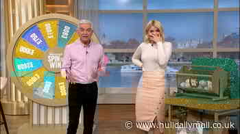 Spin to Win chaos as player tells Holly she's with friends, and they're naked