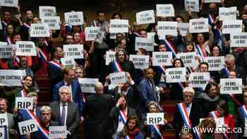 Macron's government narrowly survives no-confidence vote on pension reform in France