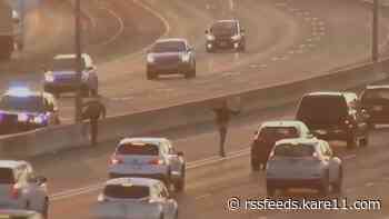 Suspect arrested after running into I-394 traffic