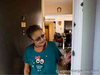 Neighbour describes night Edmonton police officers were killed, has six bullet holes in doorway