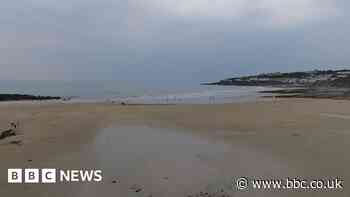 Woman drowned off Porthcurnick beach after possible heart attack
