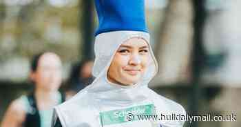 Woman explains why she dresses up as a water bottle to go running - despite 'weird stares'