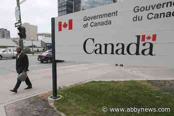 Two men who lost fingers crossing into Canada become Canadian citizens