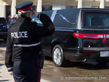 Two fallen Edmonton police officers honoured in procession