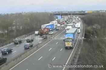 M25 Dartford Crossing traffic: Man on central reservation
