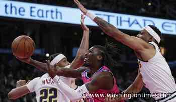 Nikola Jokic scores 31, Nuggets pull away from Wizards 118-104