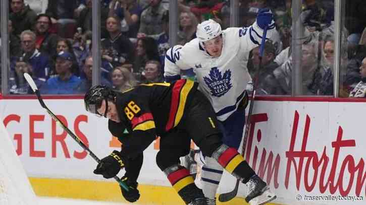 Canucks sign defenceman Christian Wolanin to two-year, two-way extension