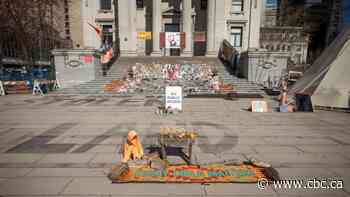 Volunteers push back against Vancouver's request to remove memorial for residential school victims